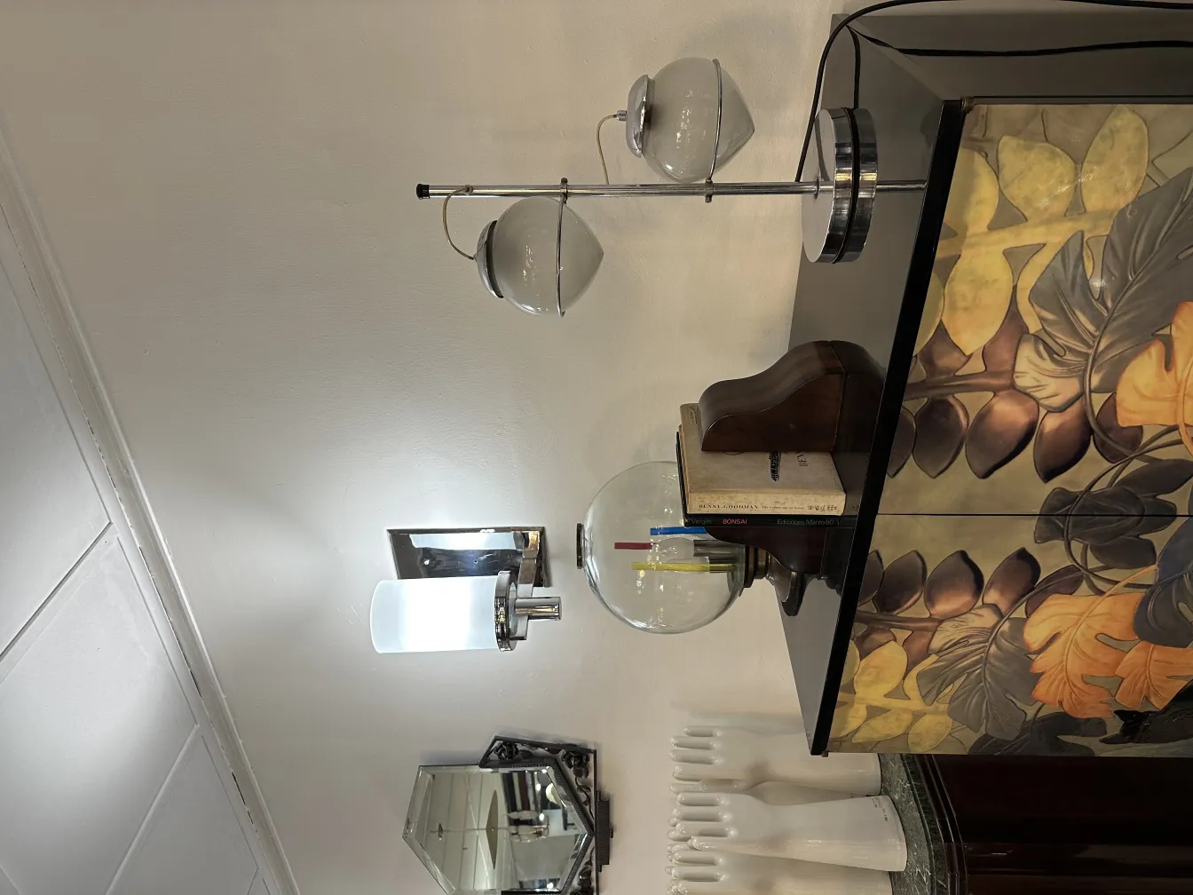 Antique table lamp with bright light and decorative details in an elegant setting.