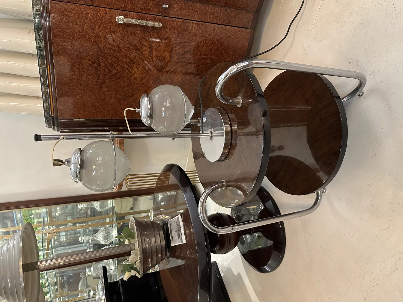 antique table lamp with a curved base in an elegant setting