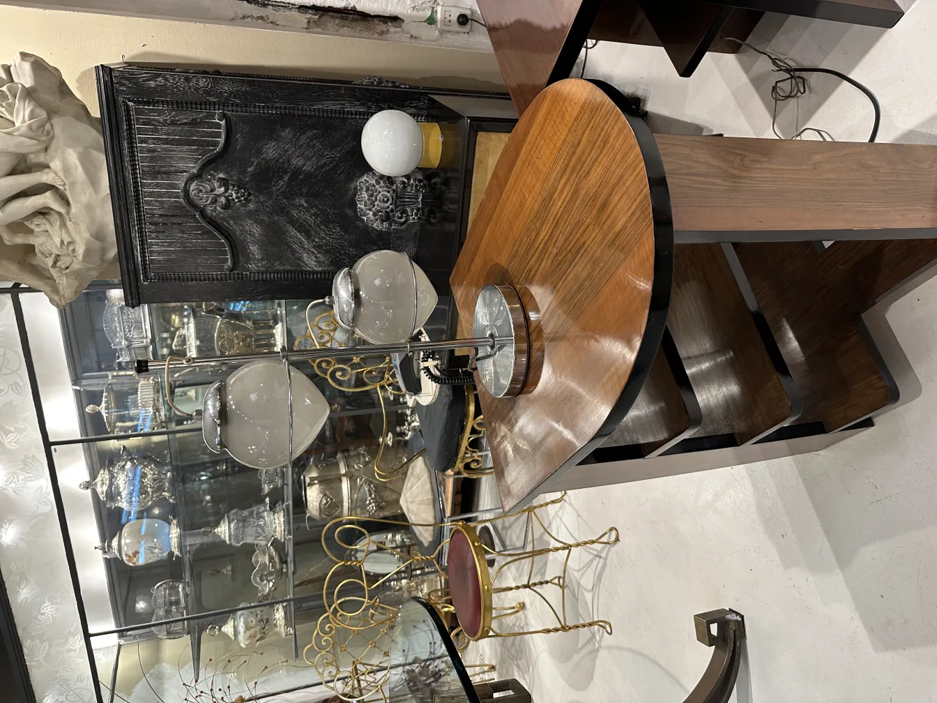 Antique table lamp featuring white spheres and elegant display.