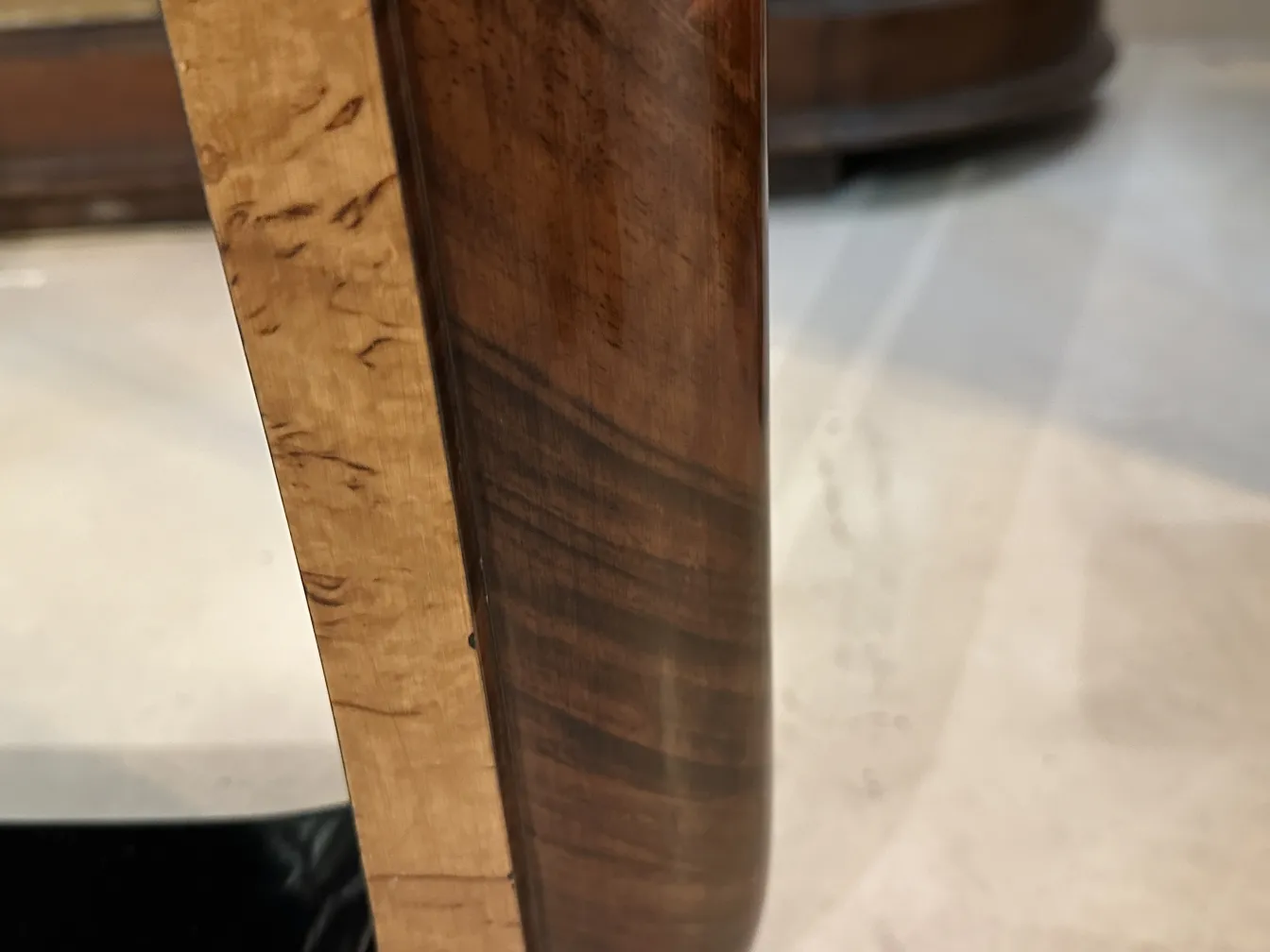 Side view of an elegant antique console with refined details