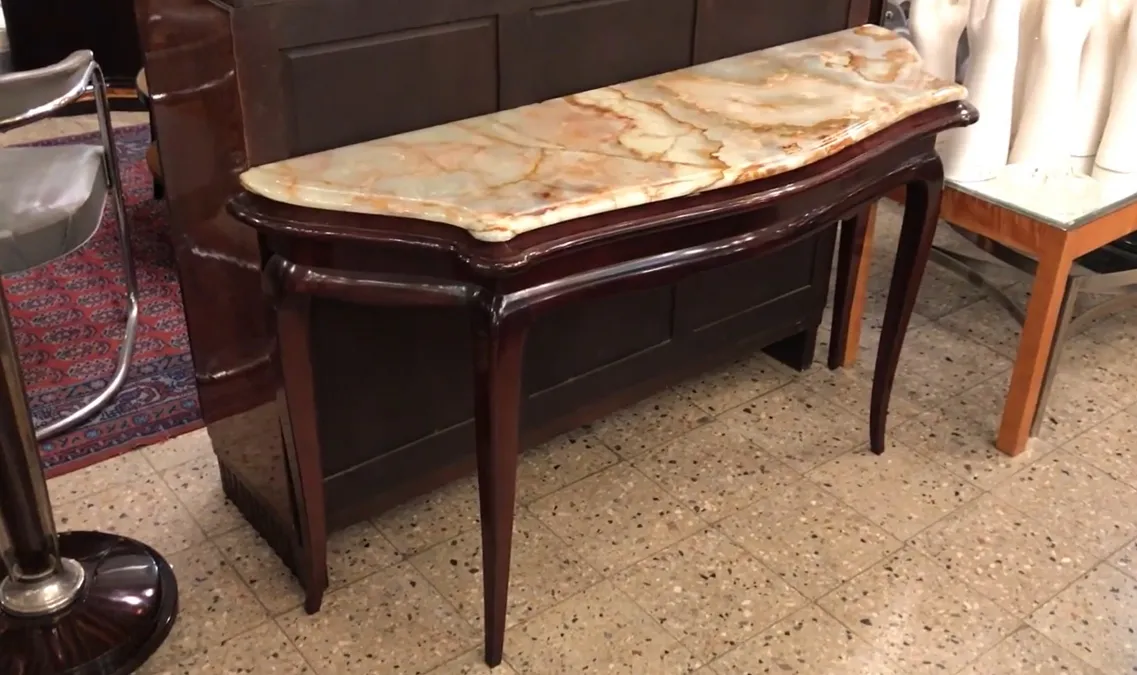 antique console table with elegant detail