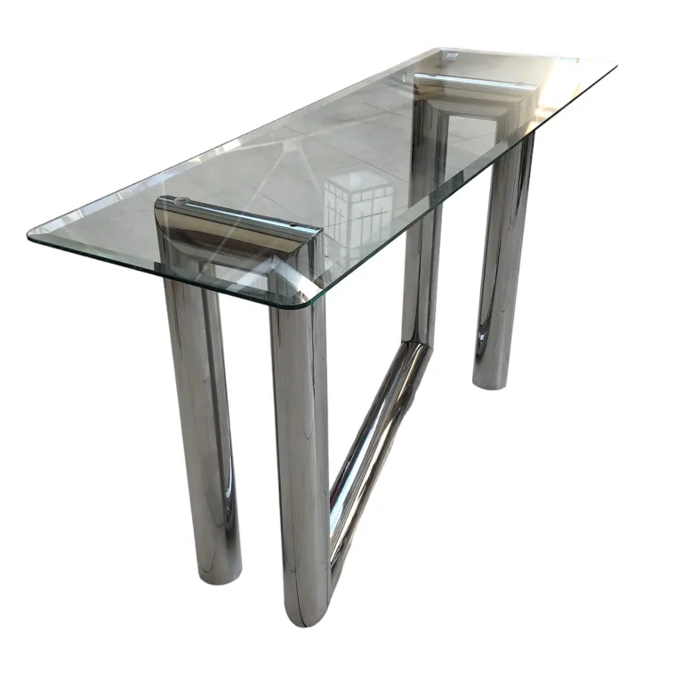 ancienne console en verre avec des pieds ronds brillants