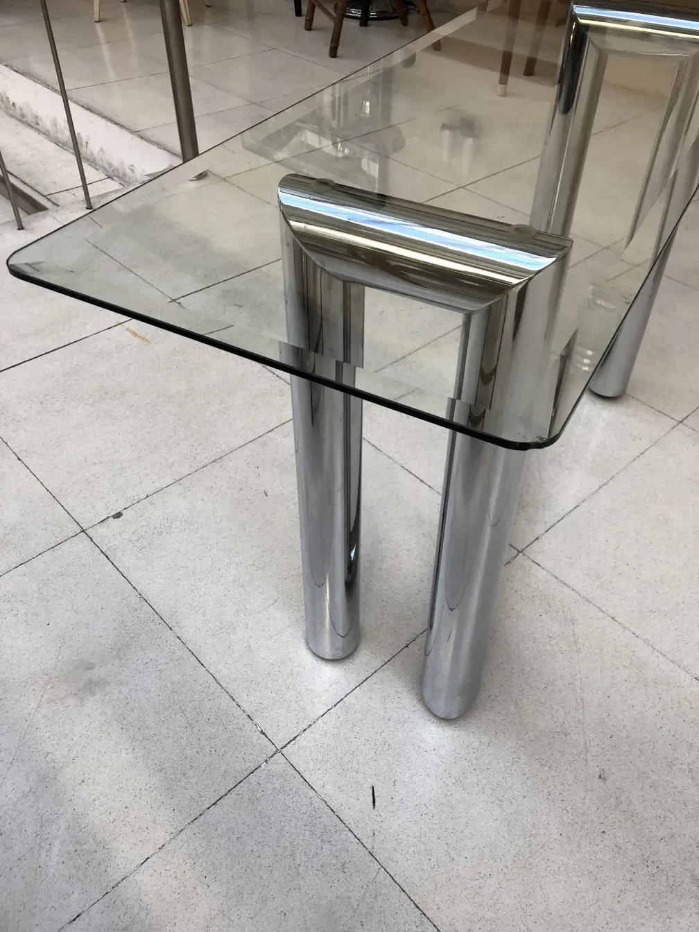 antique console table with shiny finish and legs