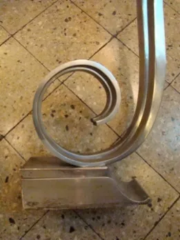 View of the base of an antique console with spiral design