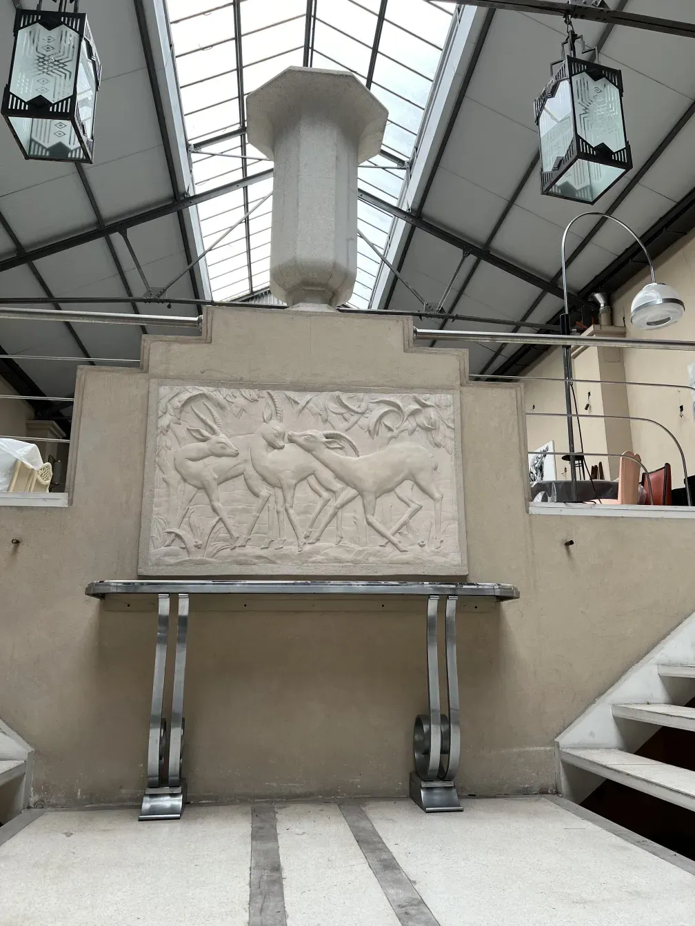 antique console Montagnac Pierre with relief details and elegant setting