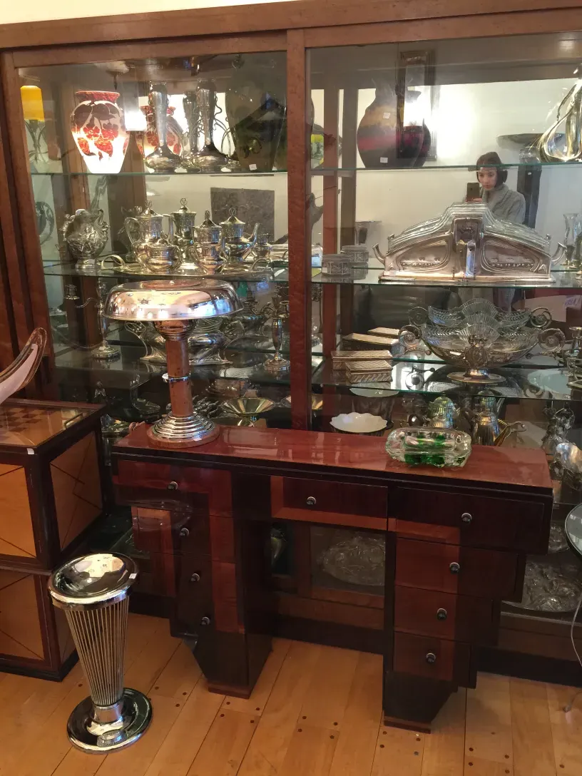 antique console with multiple compartments and elegant style