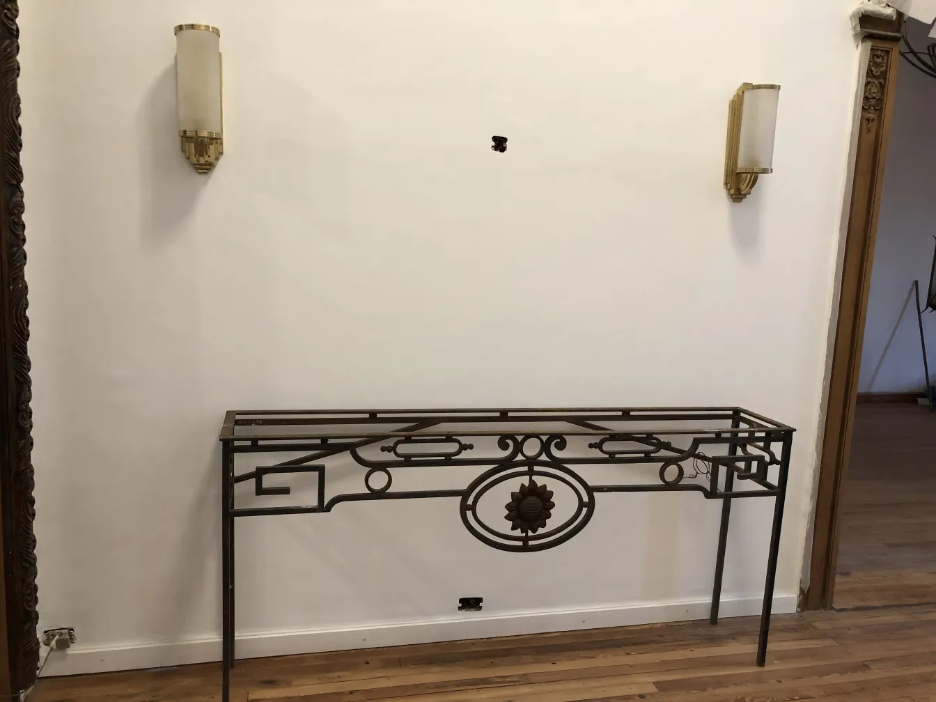 Antique console table with elegant design and embellishments