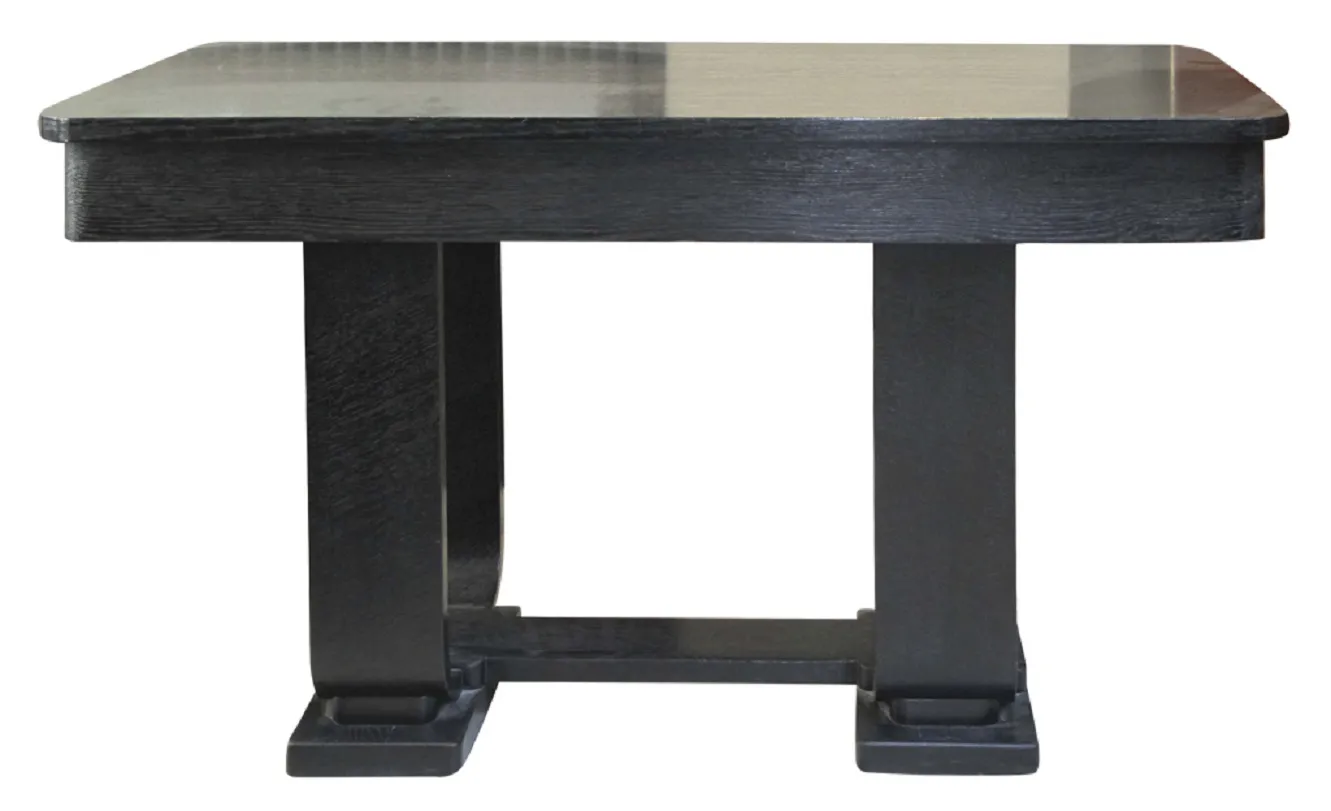 antique black console with sturdy legs in a classic setting