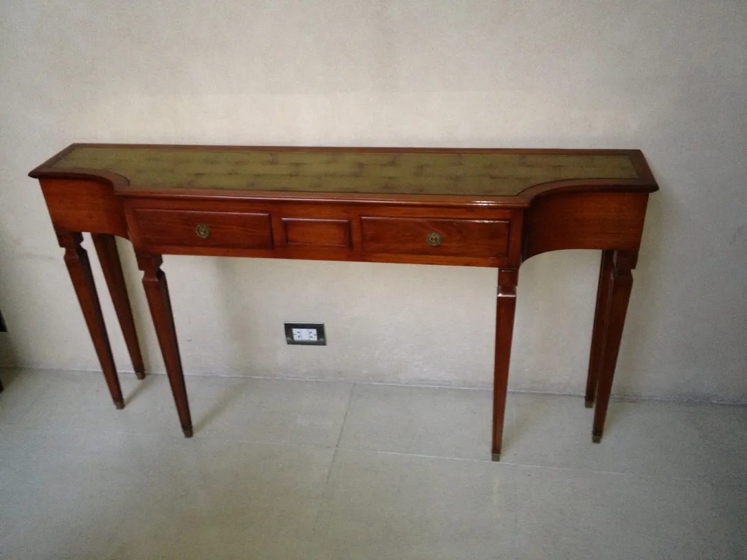 antique console with decorative top and two drawers