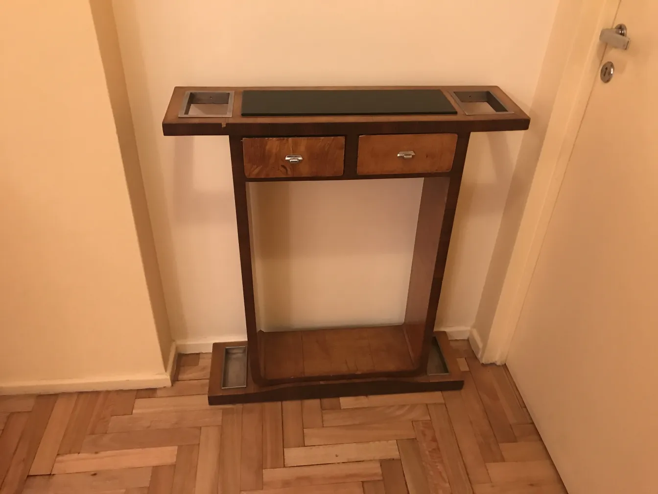 antique console with drawers in light room
