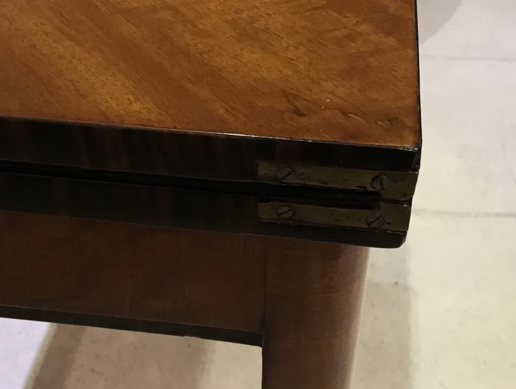 top view of an antique console with rounded corner