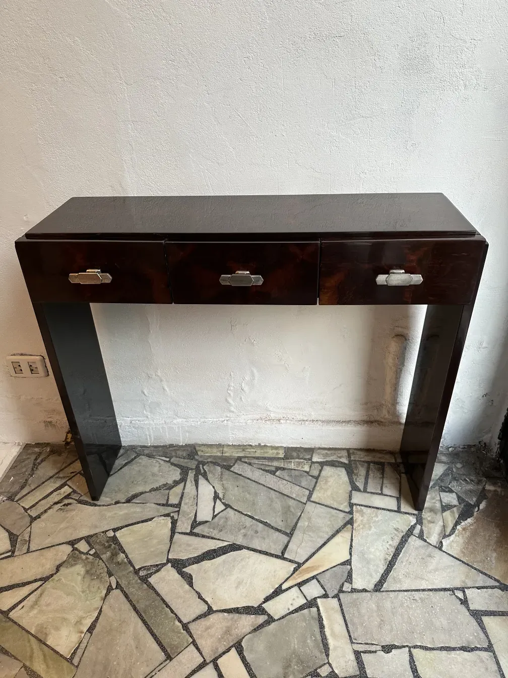 two antique consoles with elegant design and drawers