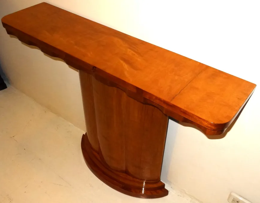 two vintage consoles with elegant design against the wall