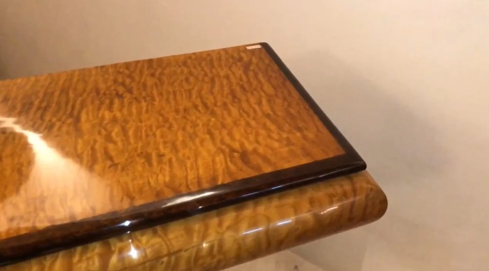 View of two antique consoles in a cozy setting