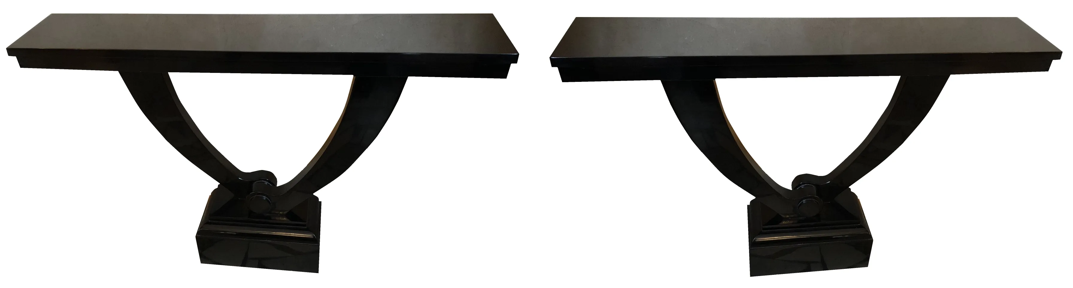 Side view of 2 elegant consoles with unique shape