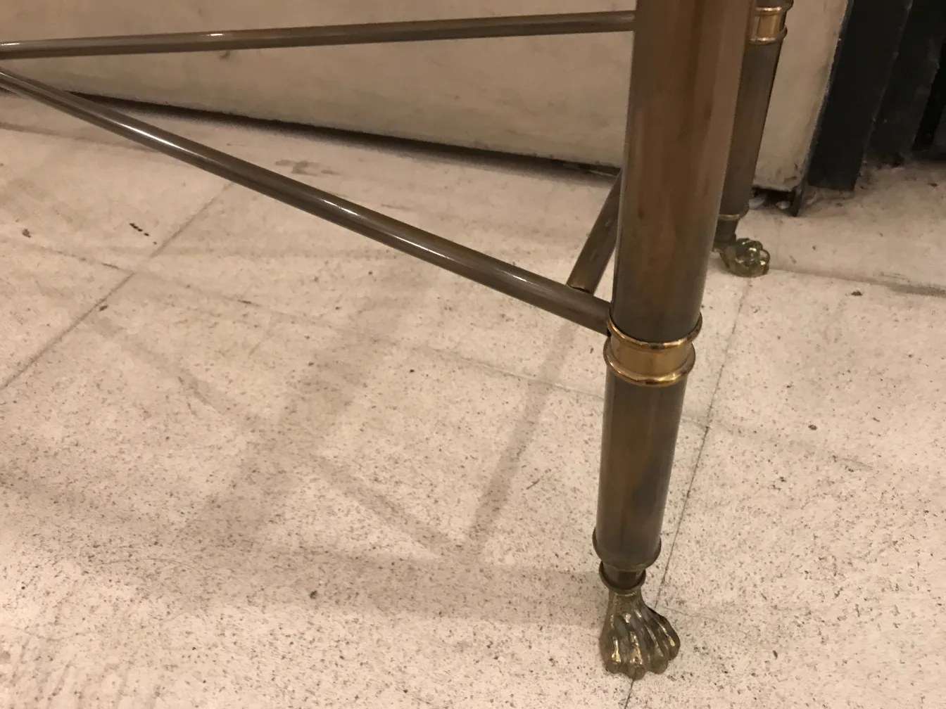 View of three antique consoles with claw-shaped legs