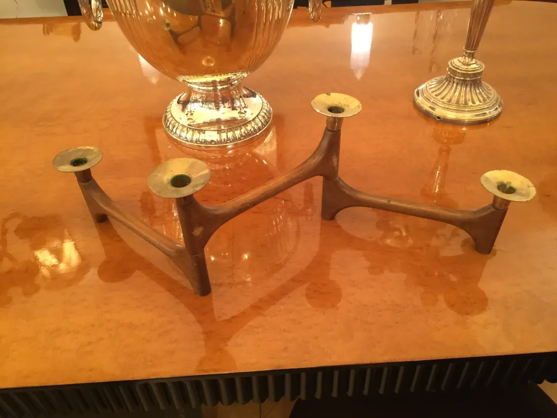 Antique three-armed candelabra on a table