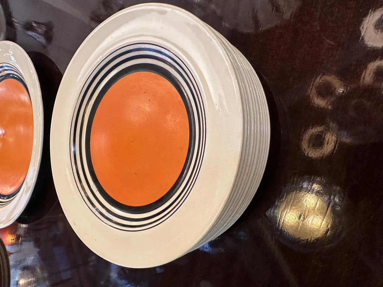 antique tea set with colorful decorative plates, warm setting