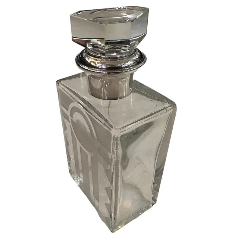 antique bottle with decorative cap and elegant shape