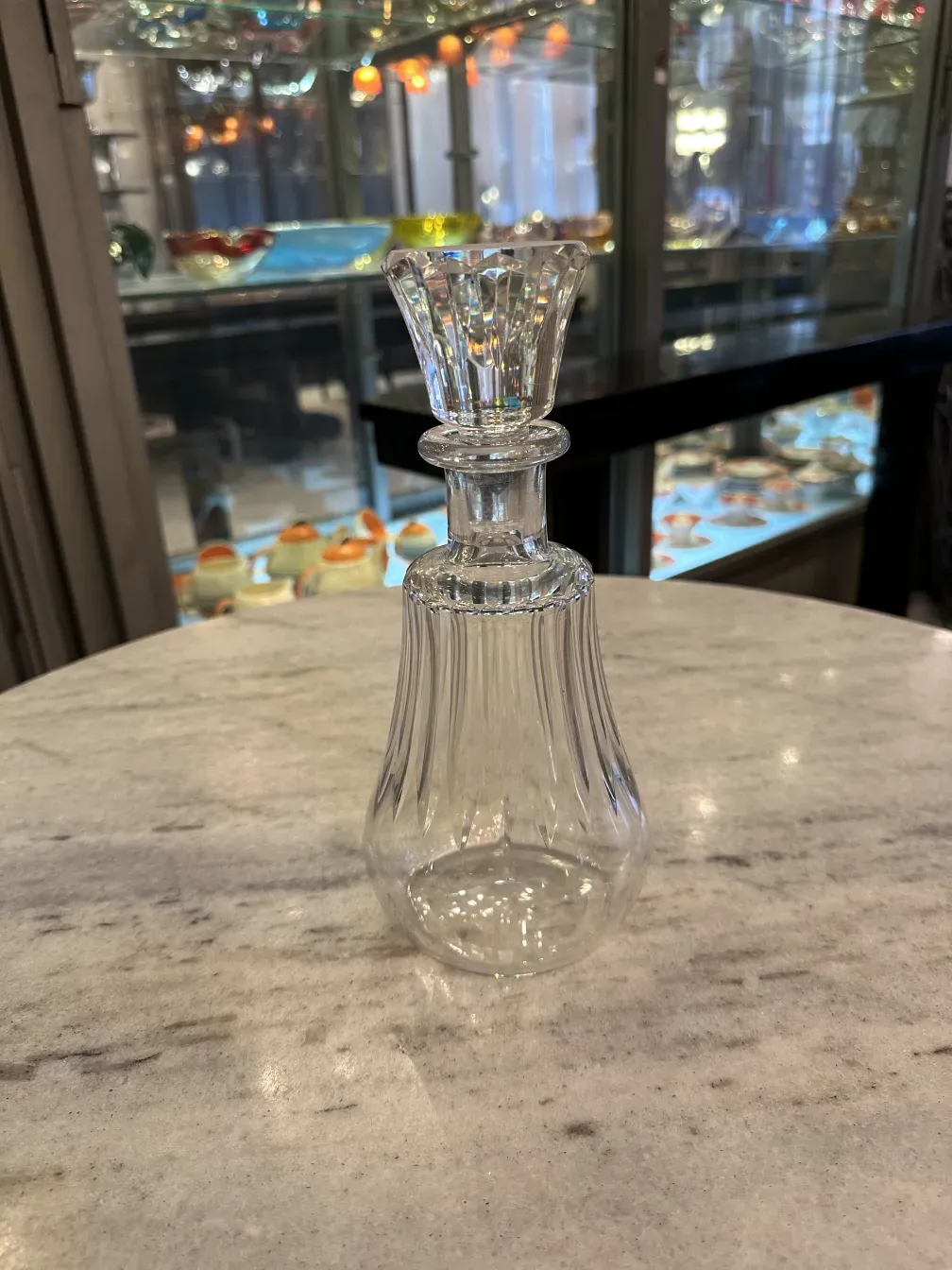 antique bottle with decorative details in an elegant setting