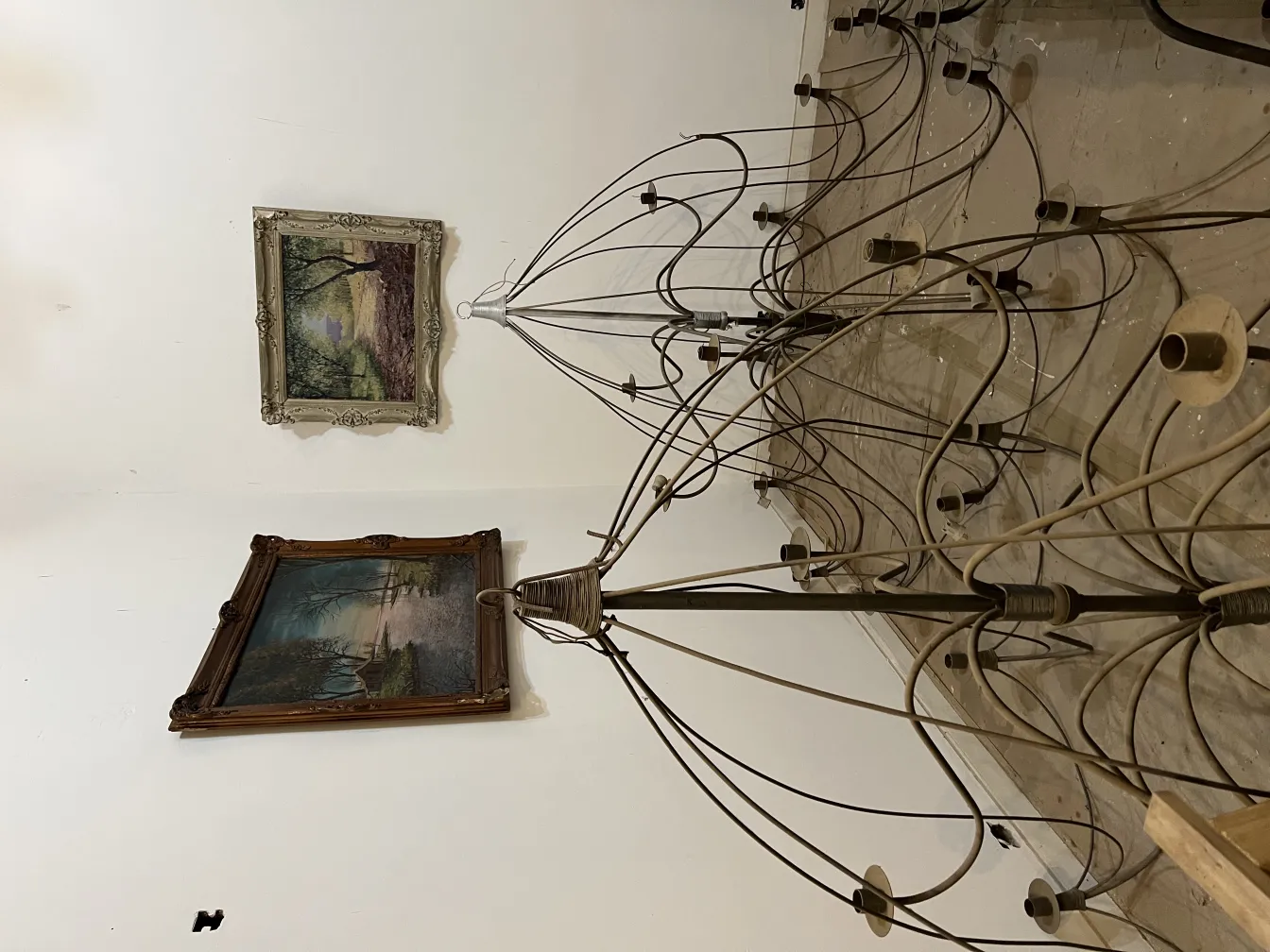 Detailed 3 antique hanging lamps in an elegant setting.