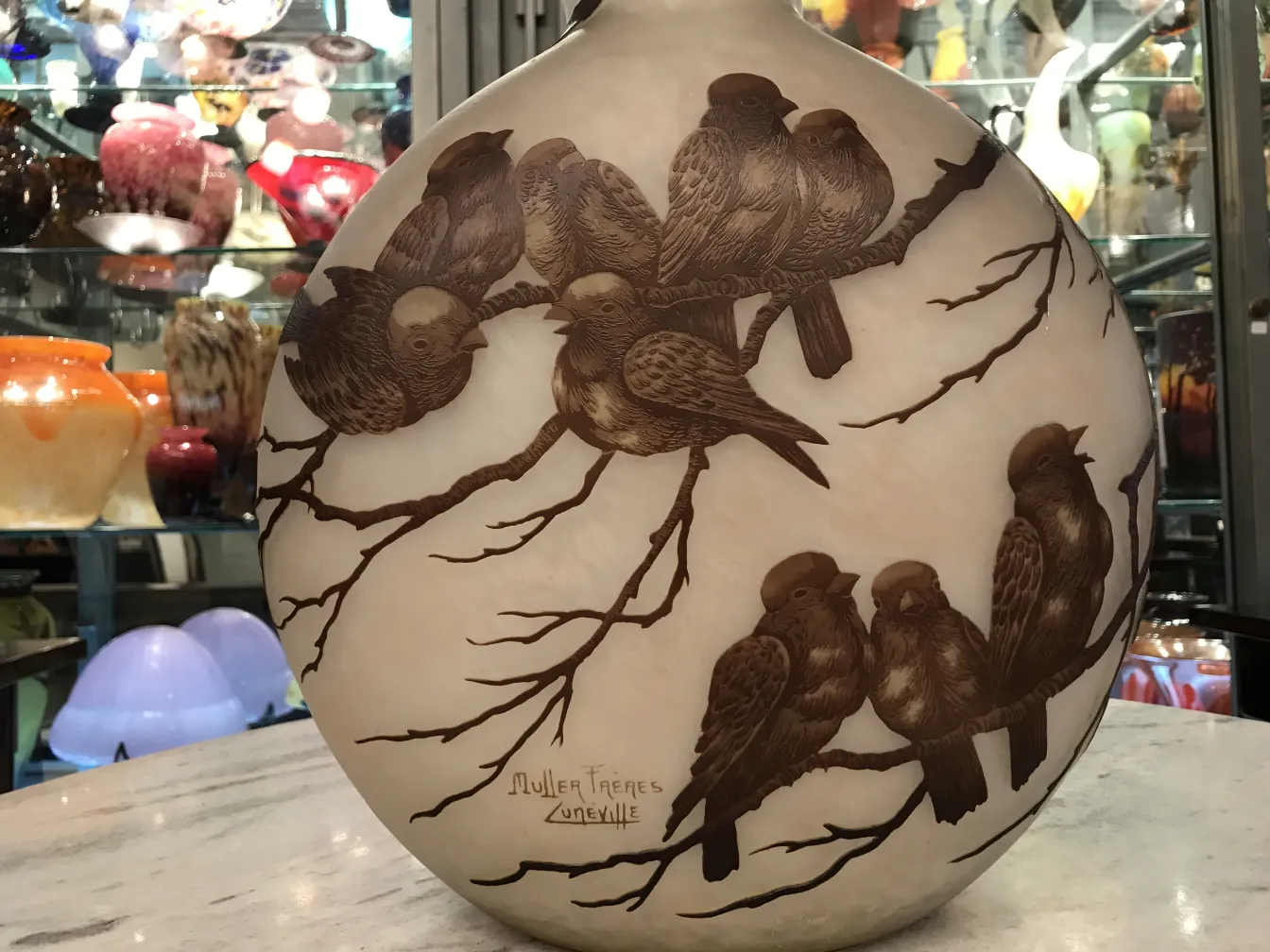 Antique signed glass Muller Fres, featuring birds and branches design.