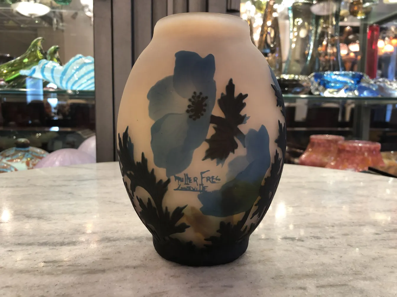 Signed glass by Muller Fres featuring flower design, antique