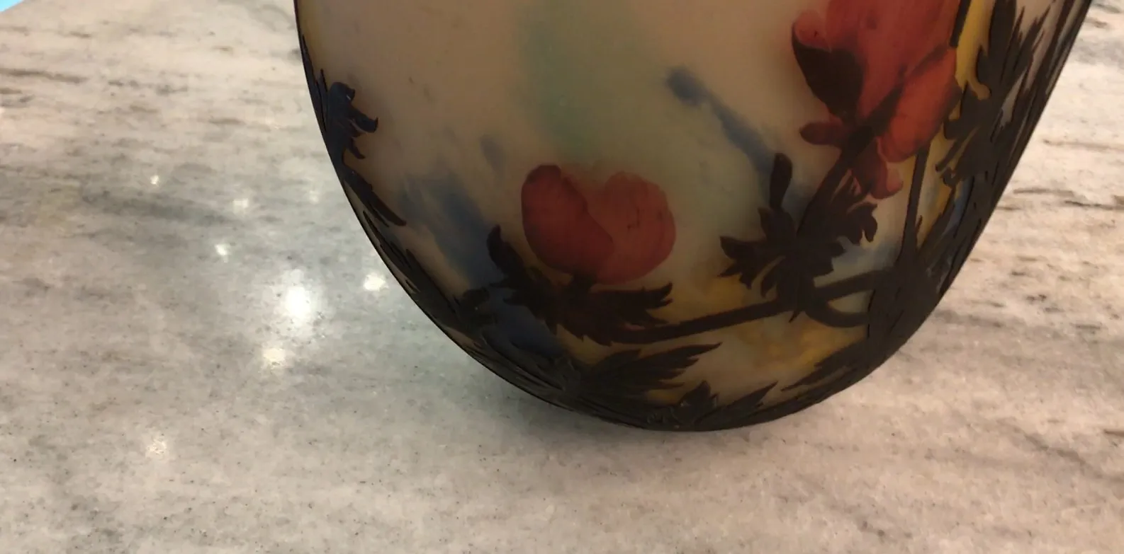 antique glass signed by Muller Fres featuring floral patterns