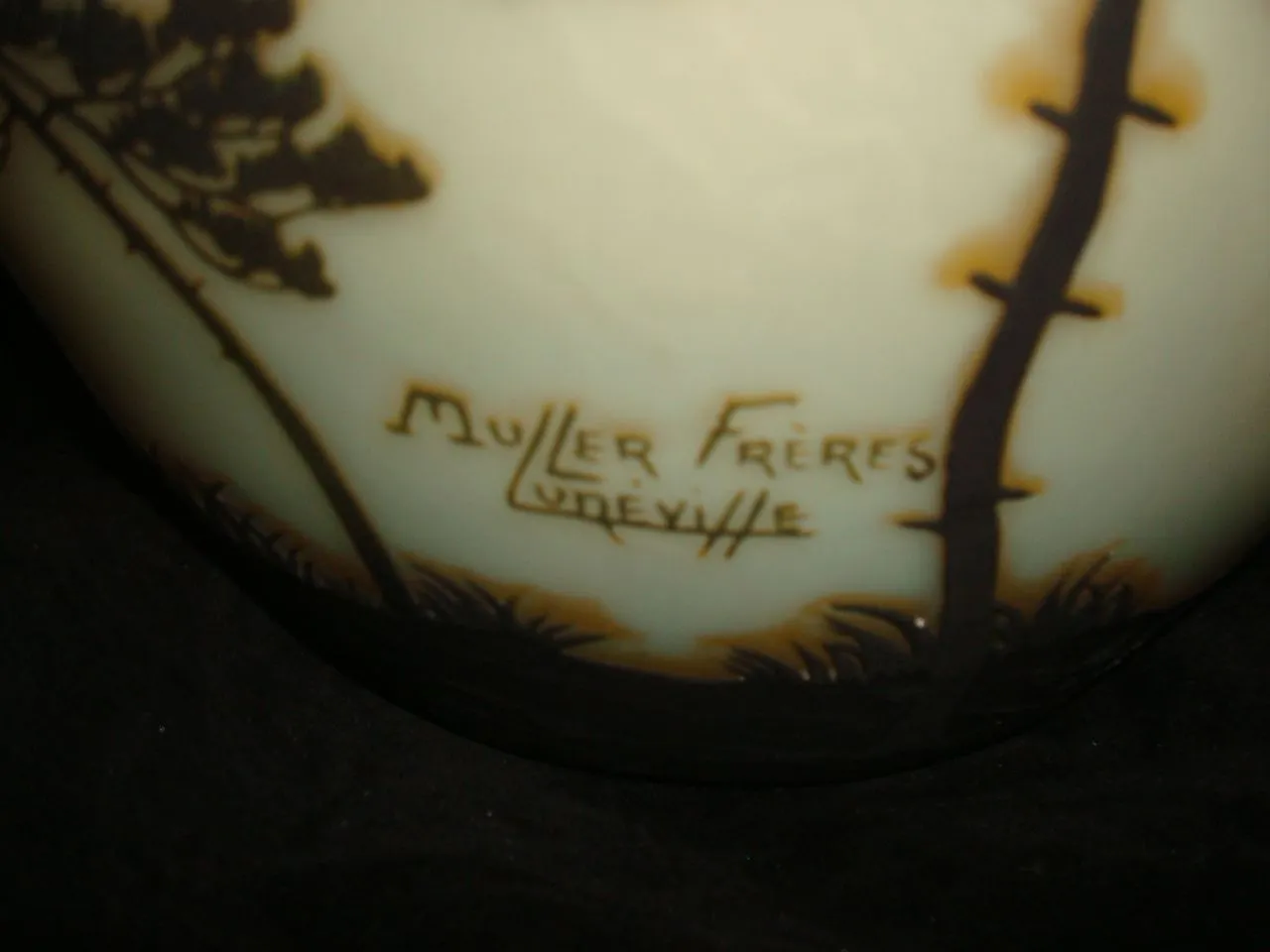 Antique signed glass by Muller Fres featuring natural scenery