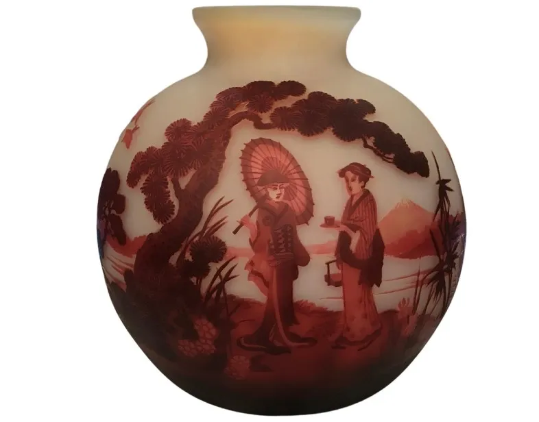 signed glass by Muller Fres with decorative figures