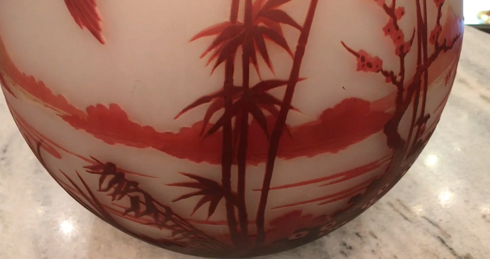 Antique signed glass Muller Fres featuring floral design in red.