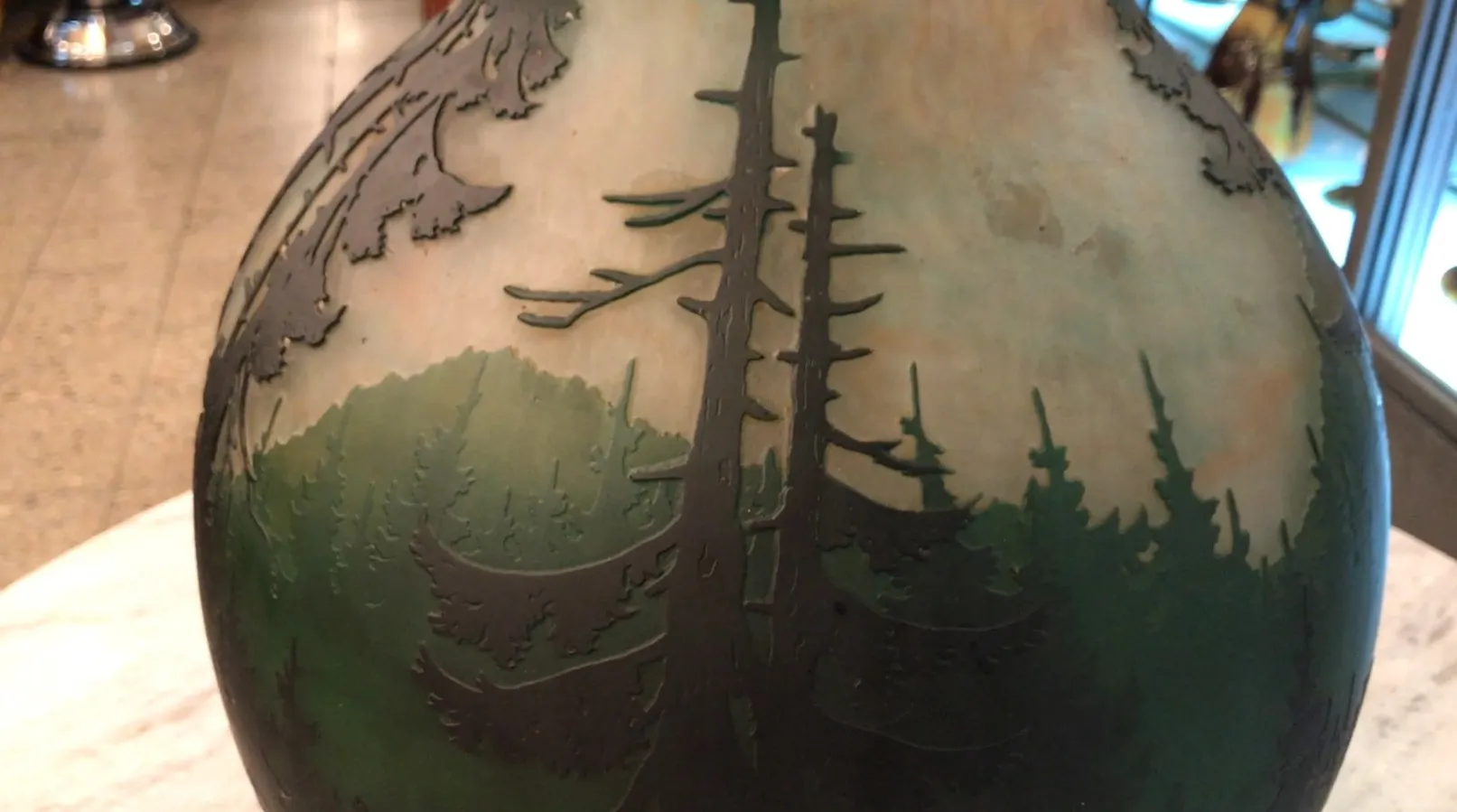 Signed glass Muller Fres with a landscape of trees and forest