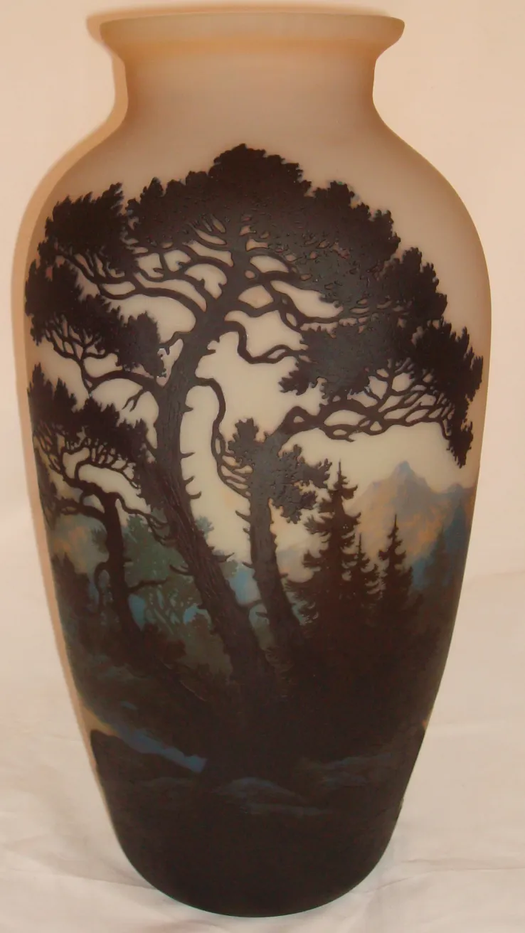 Vase featuring tree and landscape design, antique muller fres
