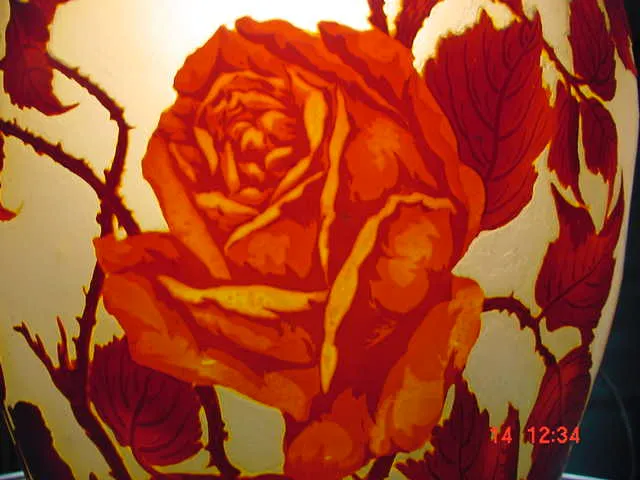 Antique signed glass by Muller Fres featuring rose design