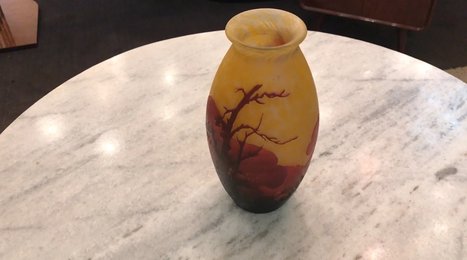 Antique decorative glass signed Muller Fres featuring tree design in orange and yellow hues