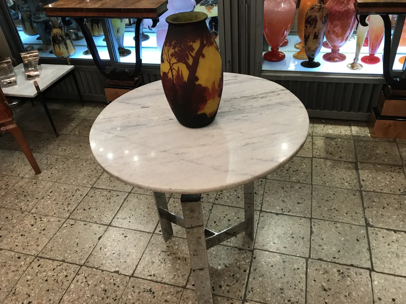 Description of antique with signed glass Muller Fres and vibrant colors.