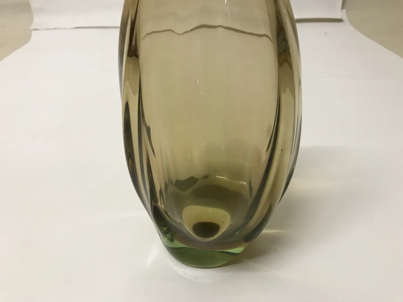 murano vase elegantly shaped with soft color on a neutral background