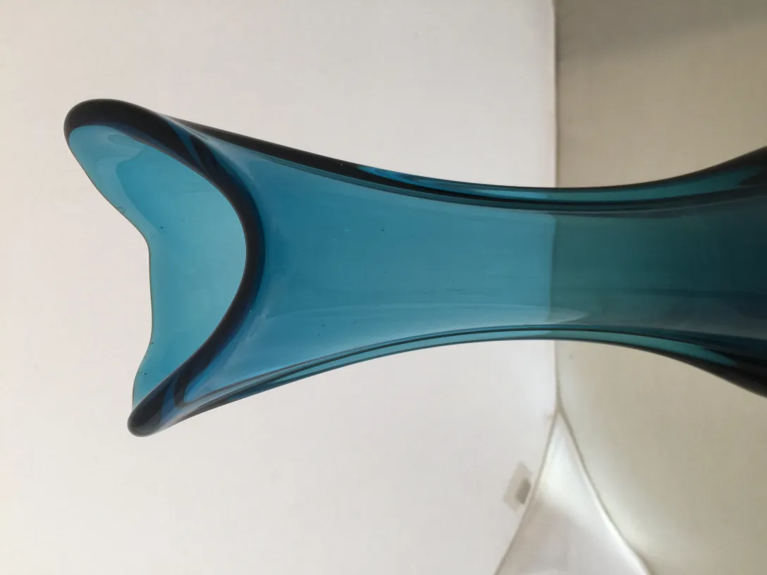 Antique Murano vase in vibrant tones, decorative.