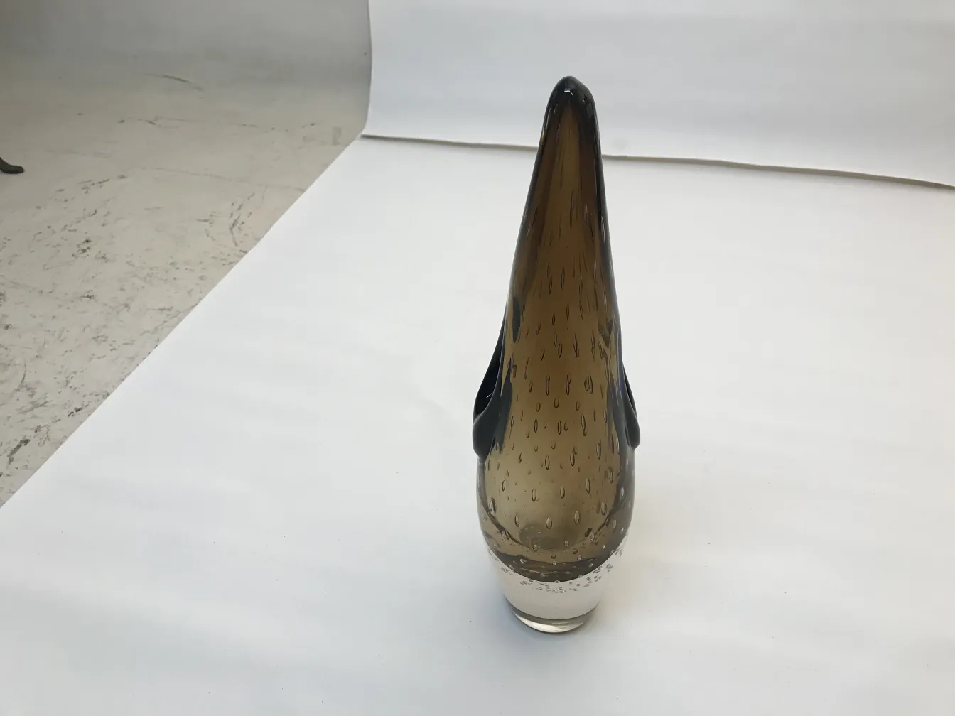 antique murano vase featuring details in shape and color