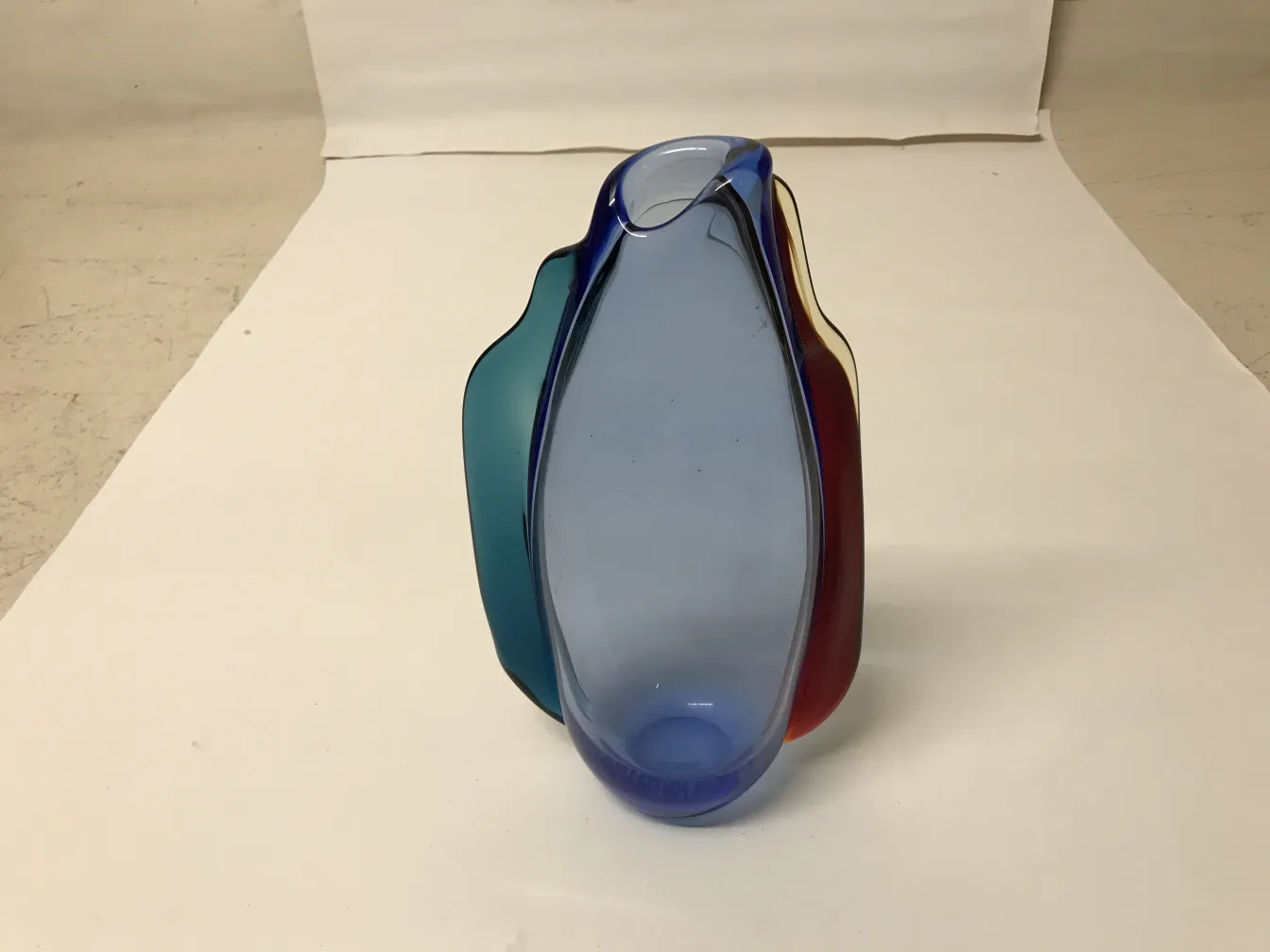 Antique Murano vase in various colors, unique shape.