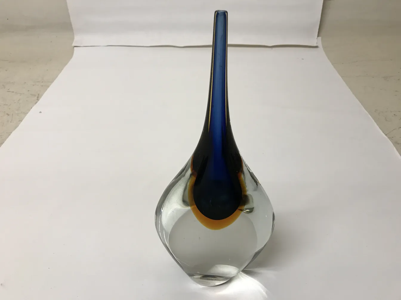 Antique Murano vase with a round base and elongated neck in bright blue.