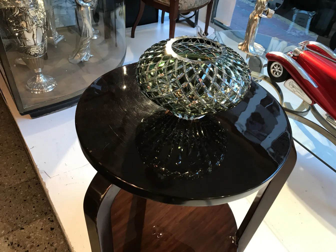 antique murano vase with beautiful colors and shapes, placed on a black table