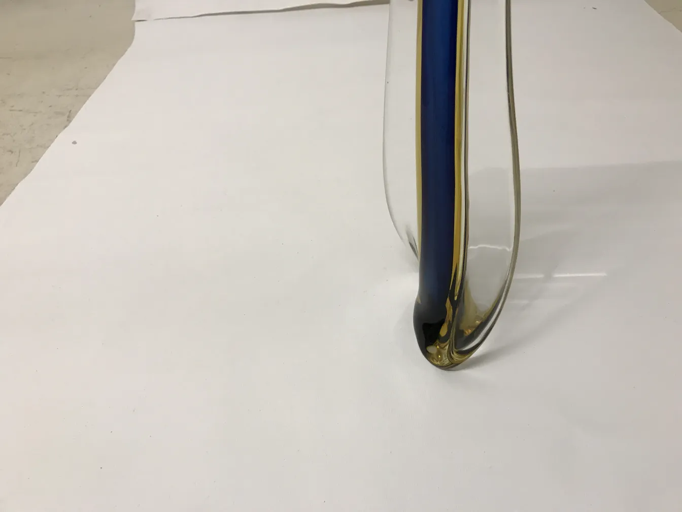 vase with a curved design and bright colors