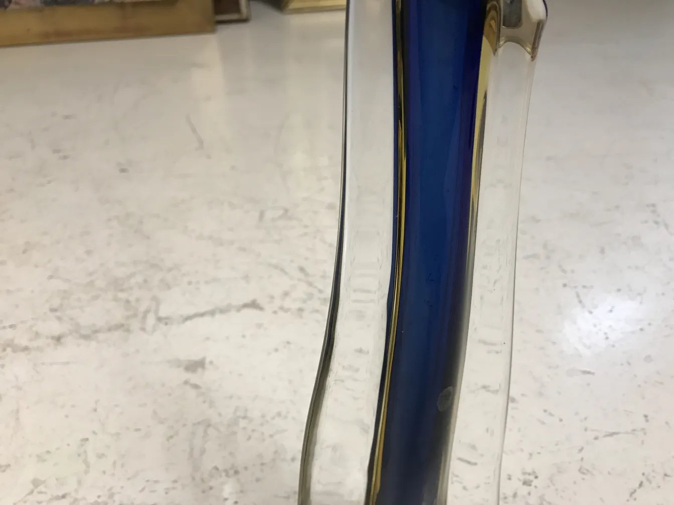 Antique Murano vase with wavy shape and blue color