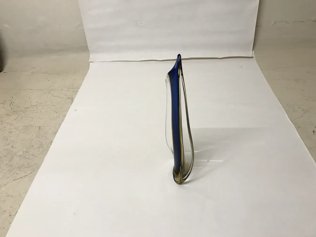 antique murano vase with elegant decorative contours, white background, stylized design