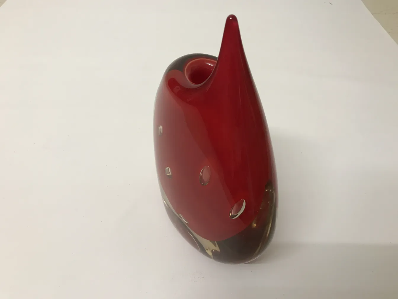 antique vase in bright red with detailed design