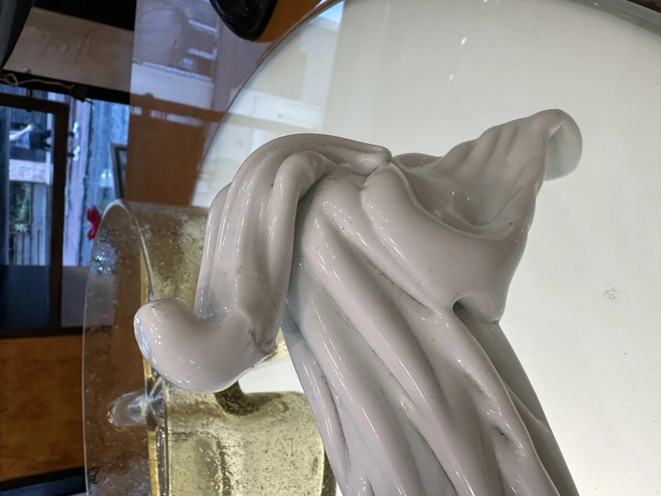 Antique Murano sculpture with fine details and soft curved shapes.