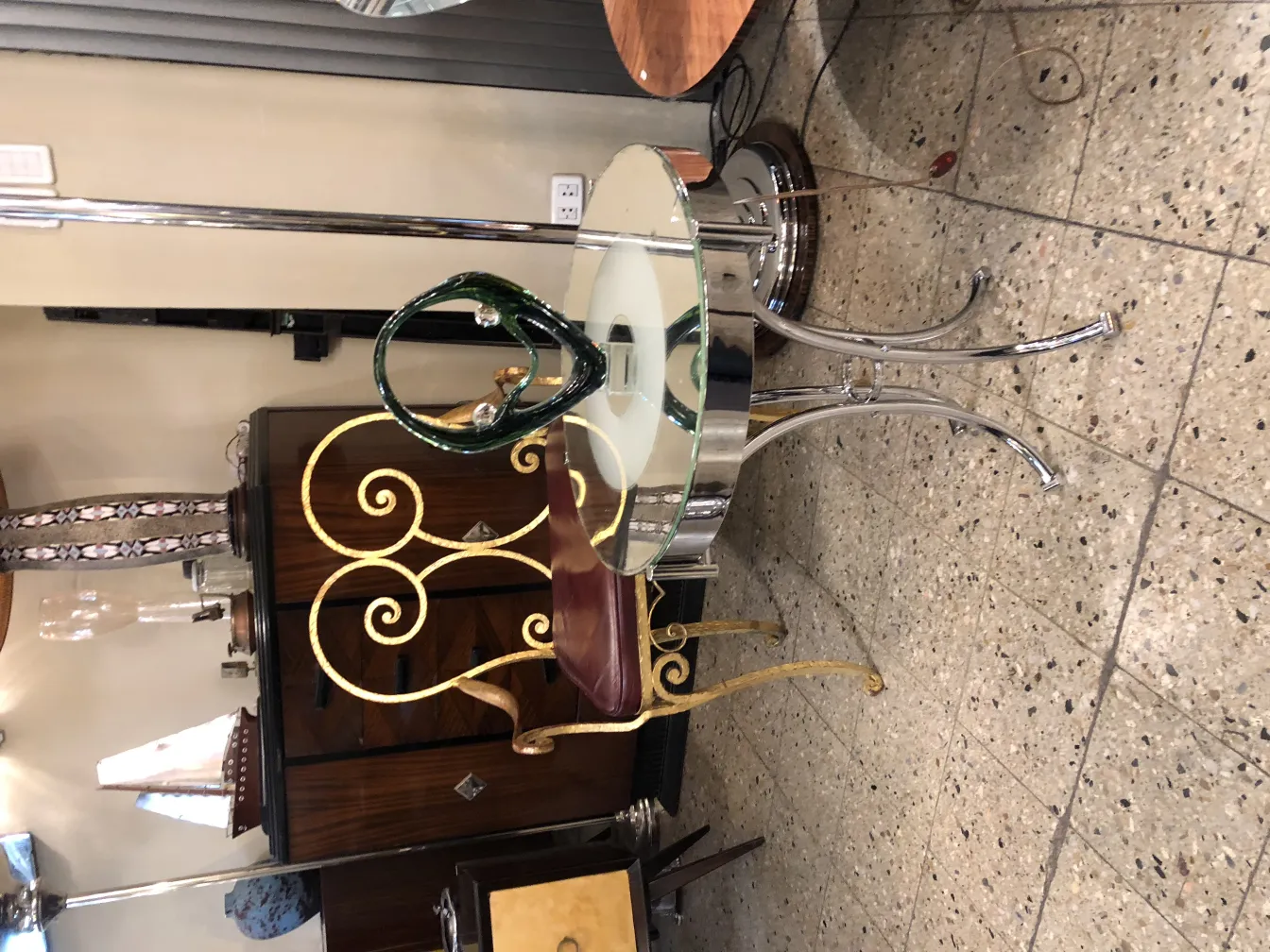 beautiful murano sculpture in green and gold, with elegant details