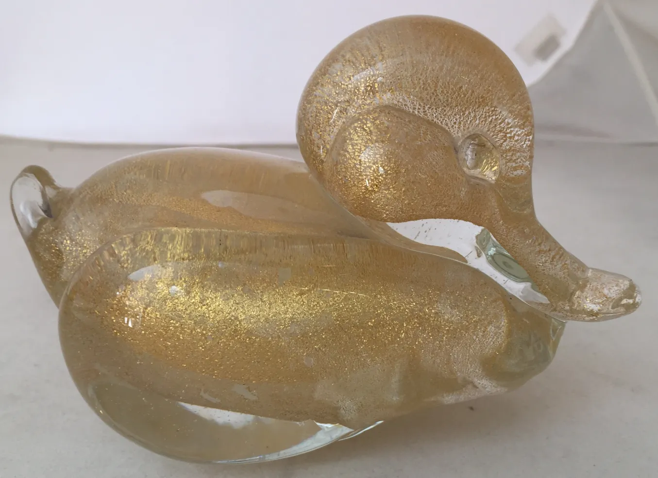 antique murano sculpture shaped like a golden duck