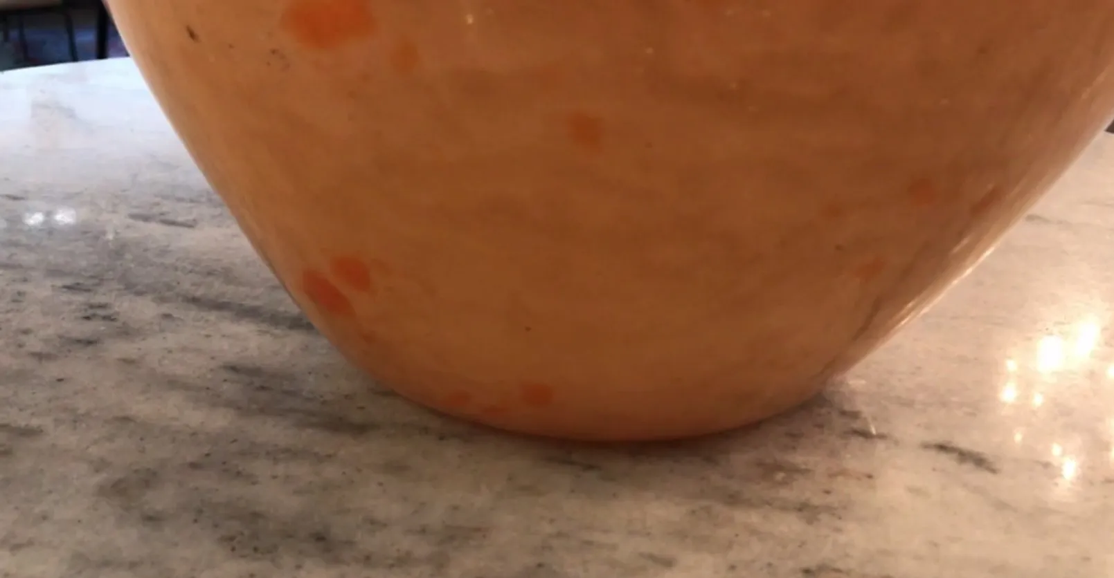 Signed glass by Schneider showcasing French cultural details.